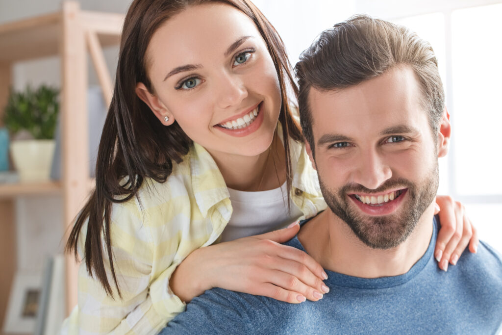 young,family,couple,together,at,home,casual