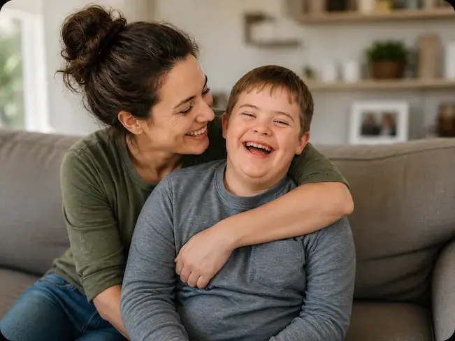 Mother smiling with her son while planning a special needs trust